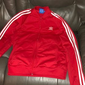 Red adidas jacket.